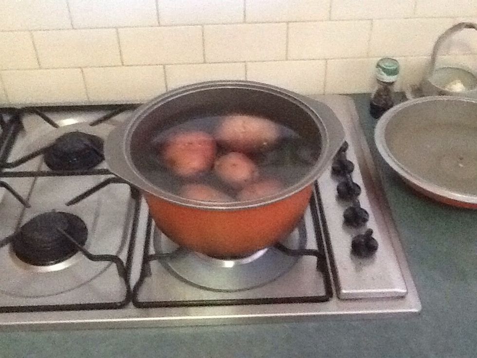 Boil red potatoes for about 20 minutes