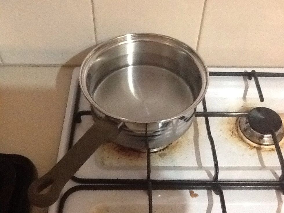Boil some water to cook the pasta