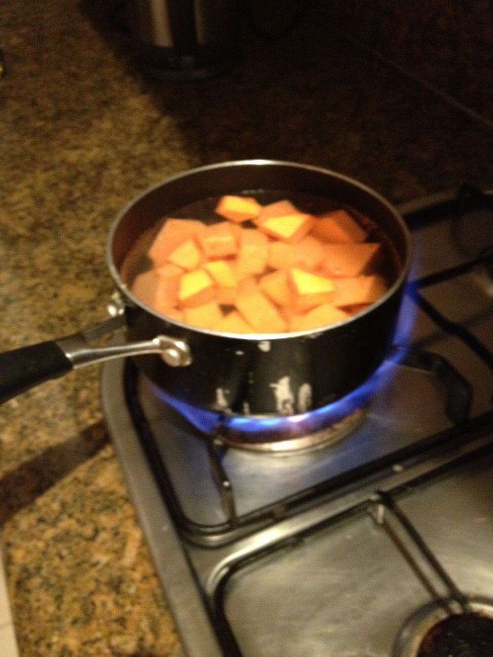 Boil sweet potatoes whilst cutting the veggies