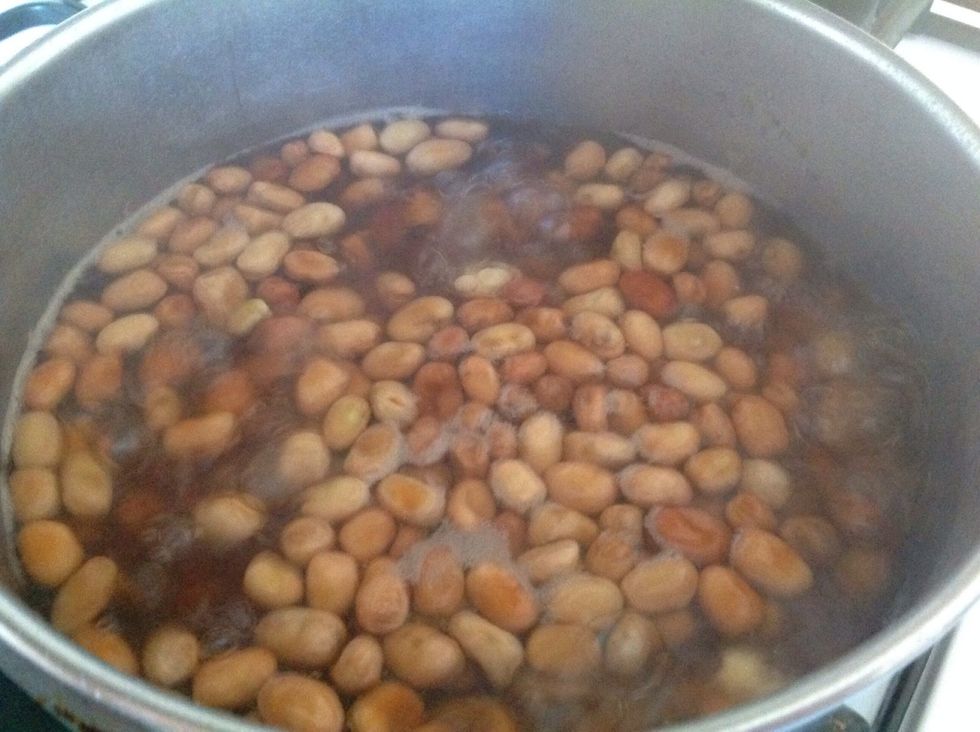 Boil the beans in water and some salt until they become soft. This will take around 20-30 minutes