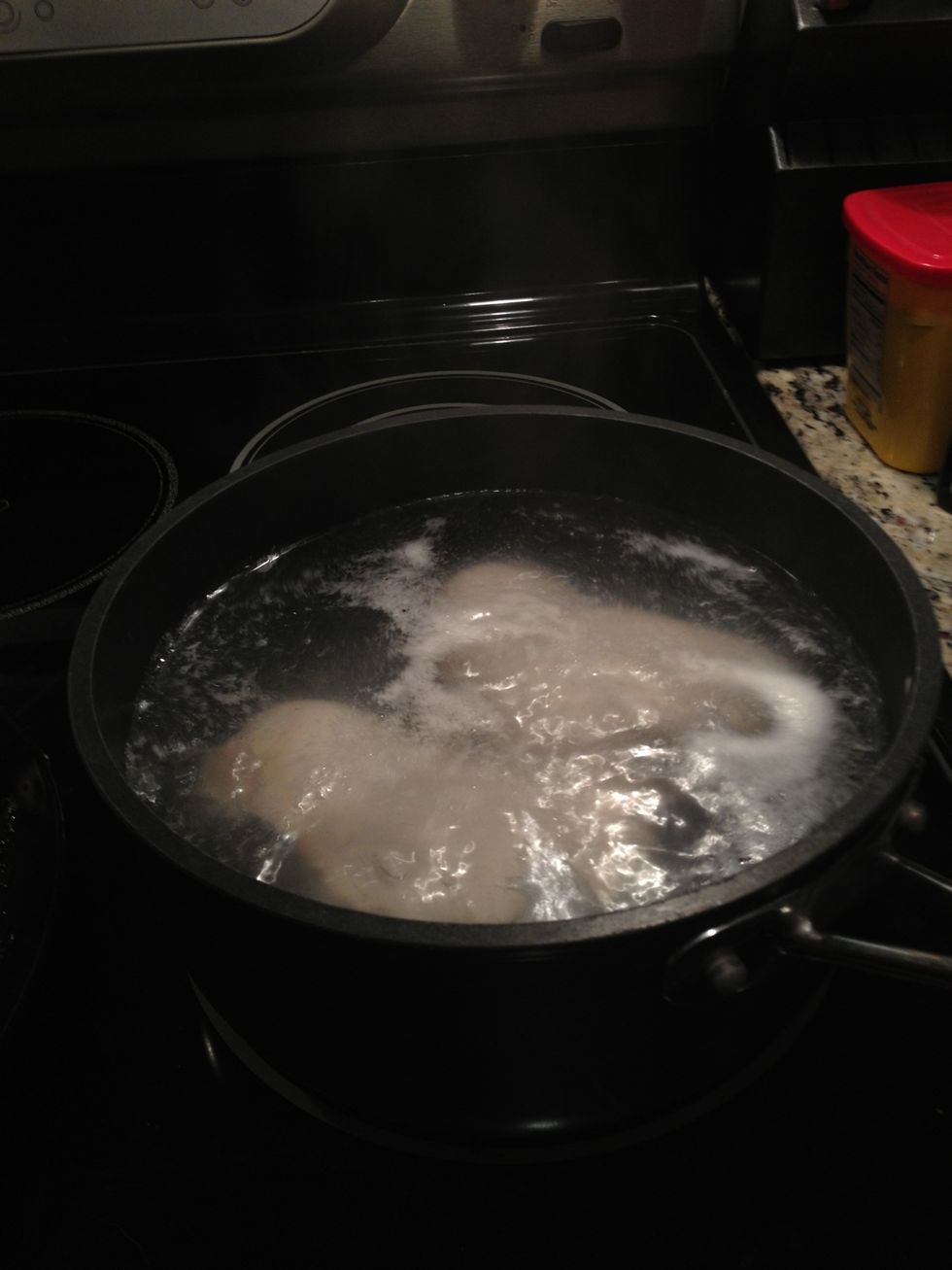 Boil the chicken breast for 8 minutes.