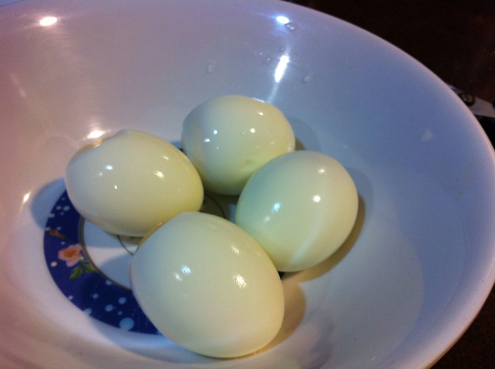 Boil the eggs. Wait for them to cool then peel carefully. Be sure to wash after peeling.