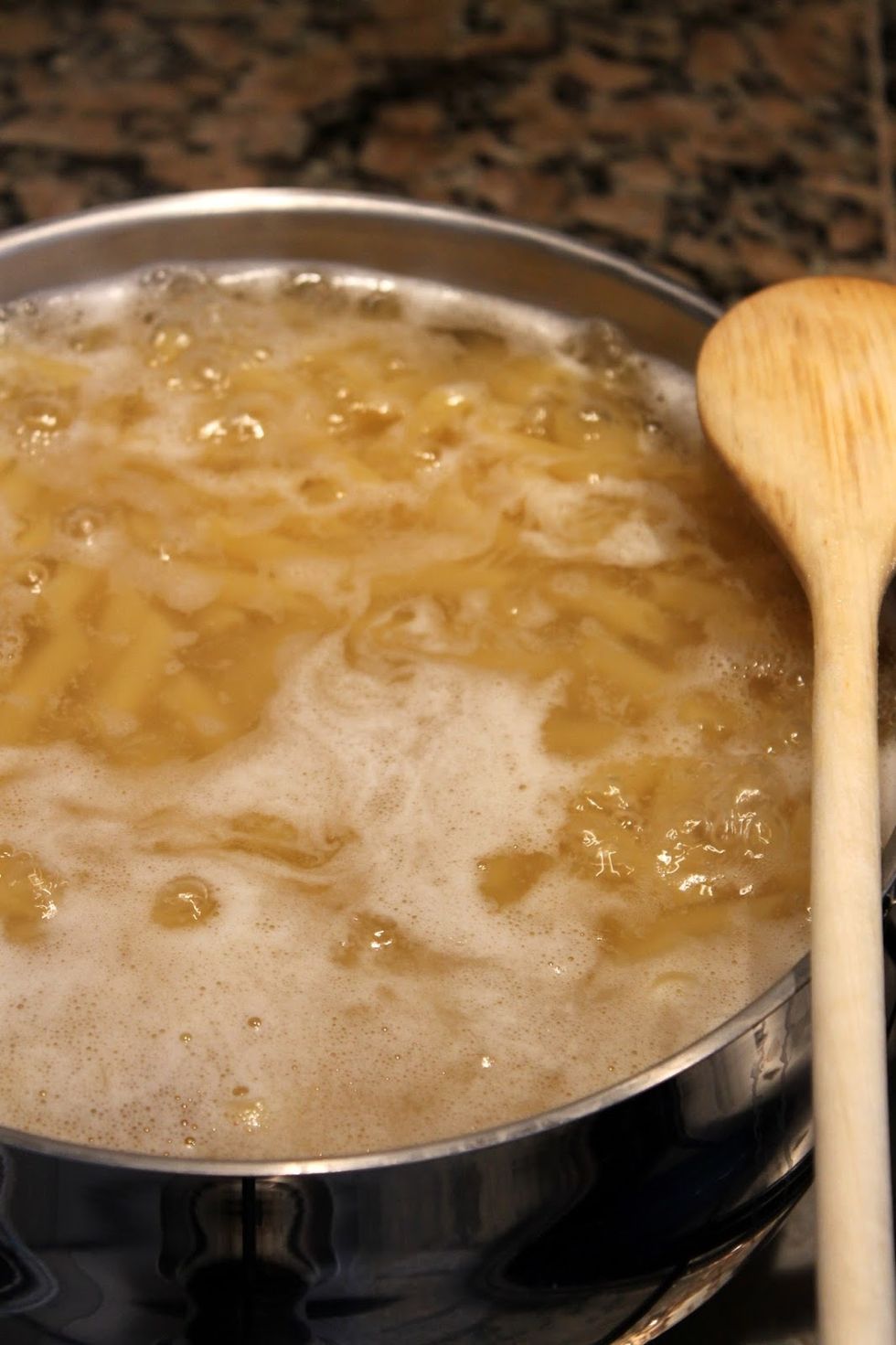 Boil the macaroni in a big pot with water and a pinch of salt