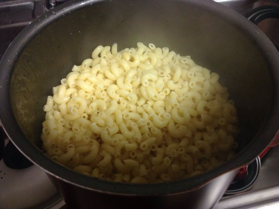 Boil the noodles and when they are done drain and set to the side