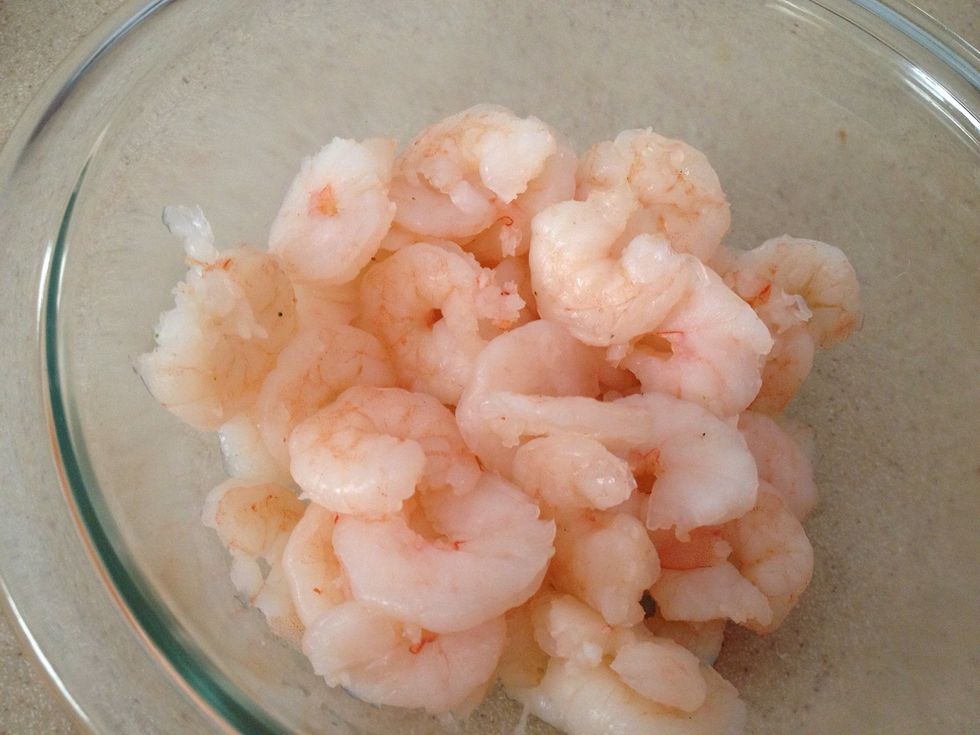 Boil the shrimp in a water/lemon juice mixture for a few minutes until they turn pink. Slice each one in half lengthwise. If you don't like shrimp, you can use any kind of cooked protein.