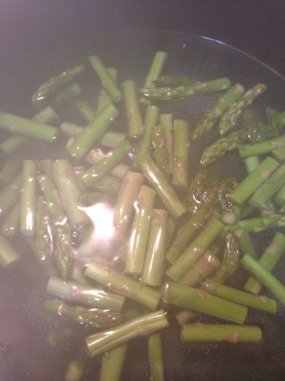 Boil the water and add pinch of salt and olive oil in it. Cook asparagus until crispy tender and remove it with slotted spoon. Remember to keep water boiling \ud83d\ude09