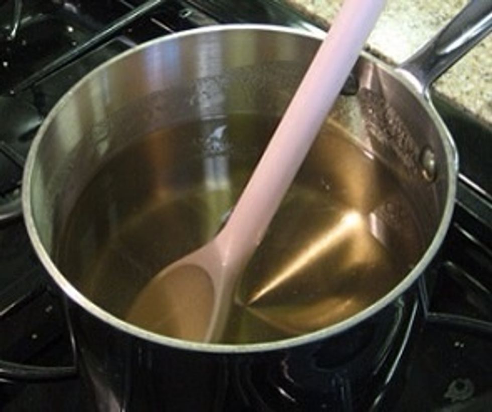 Boil the water and add the sugar to make a simple syrup. Cool for 15-20 minutes. Sieve the lemon skins out of the steeped mixture and add the 2 liquids. Leave again for another 40 days to age.