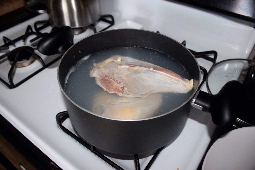 Boil the water and put chicken in it cook for 5 minutes, drained from pot and take it up set aside.
