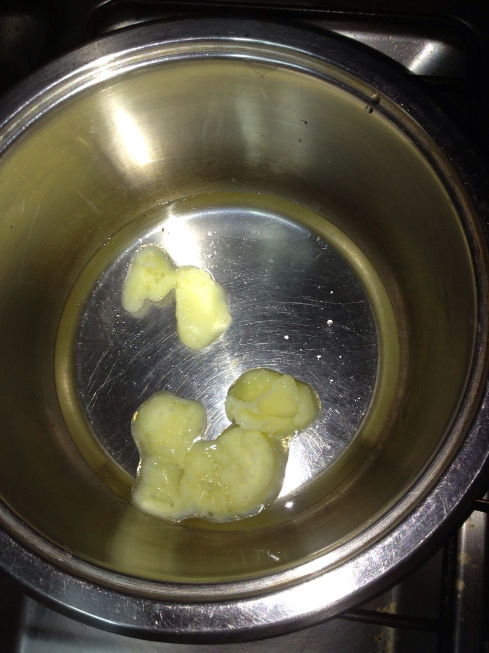 Boil the water and the butter and sprinkle a little amount of salt