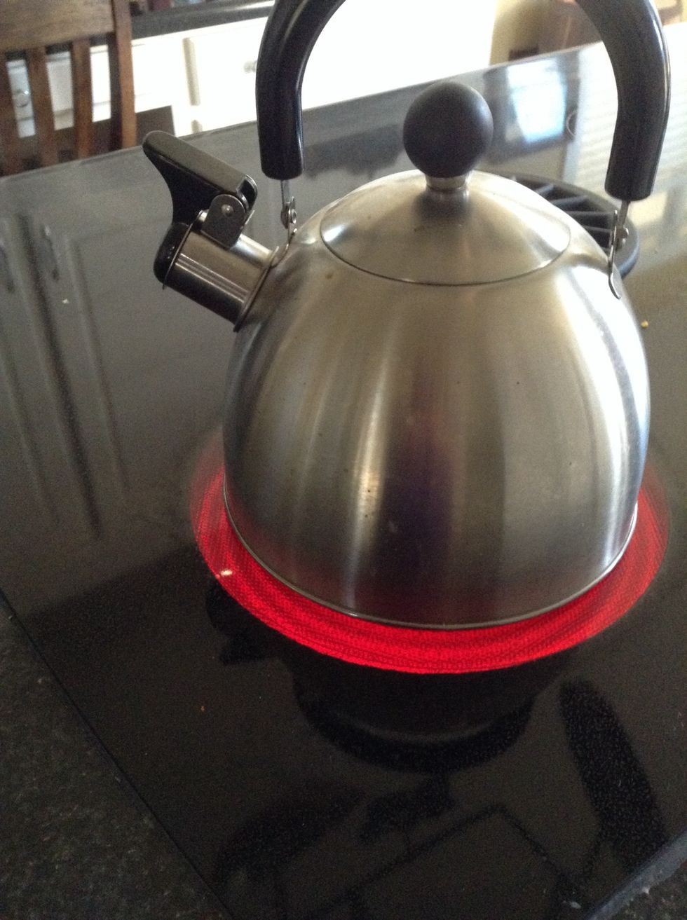 Boil the water in the kettle on high until hot.