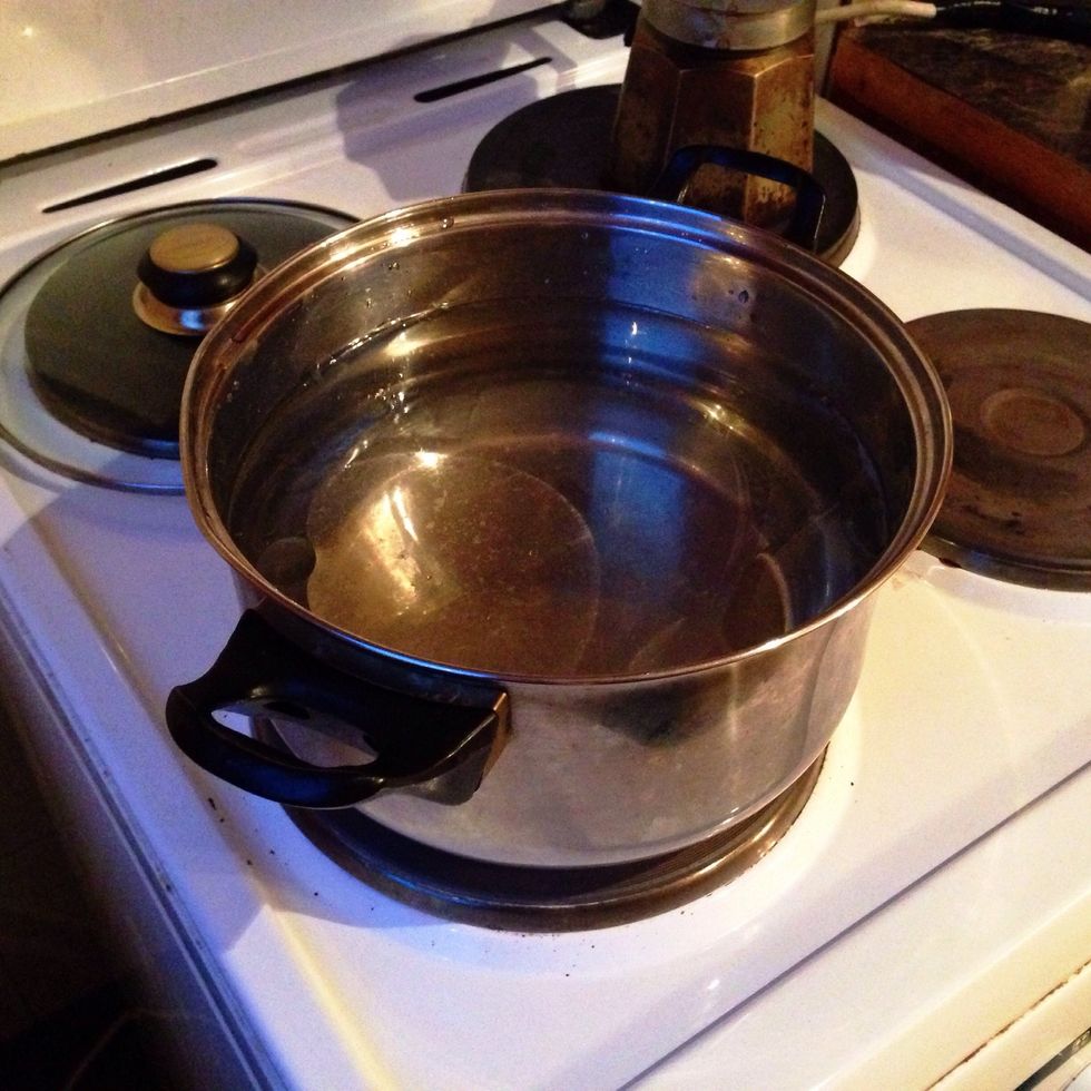 Boil the water with salt and a spoon of oil.