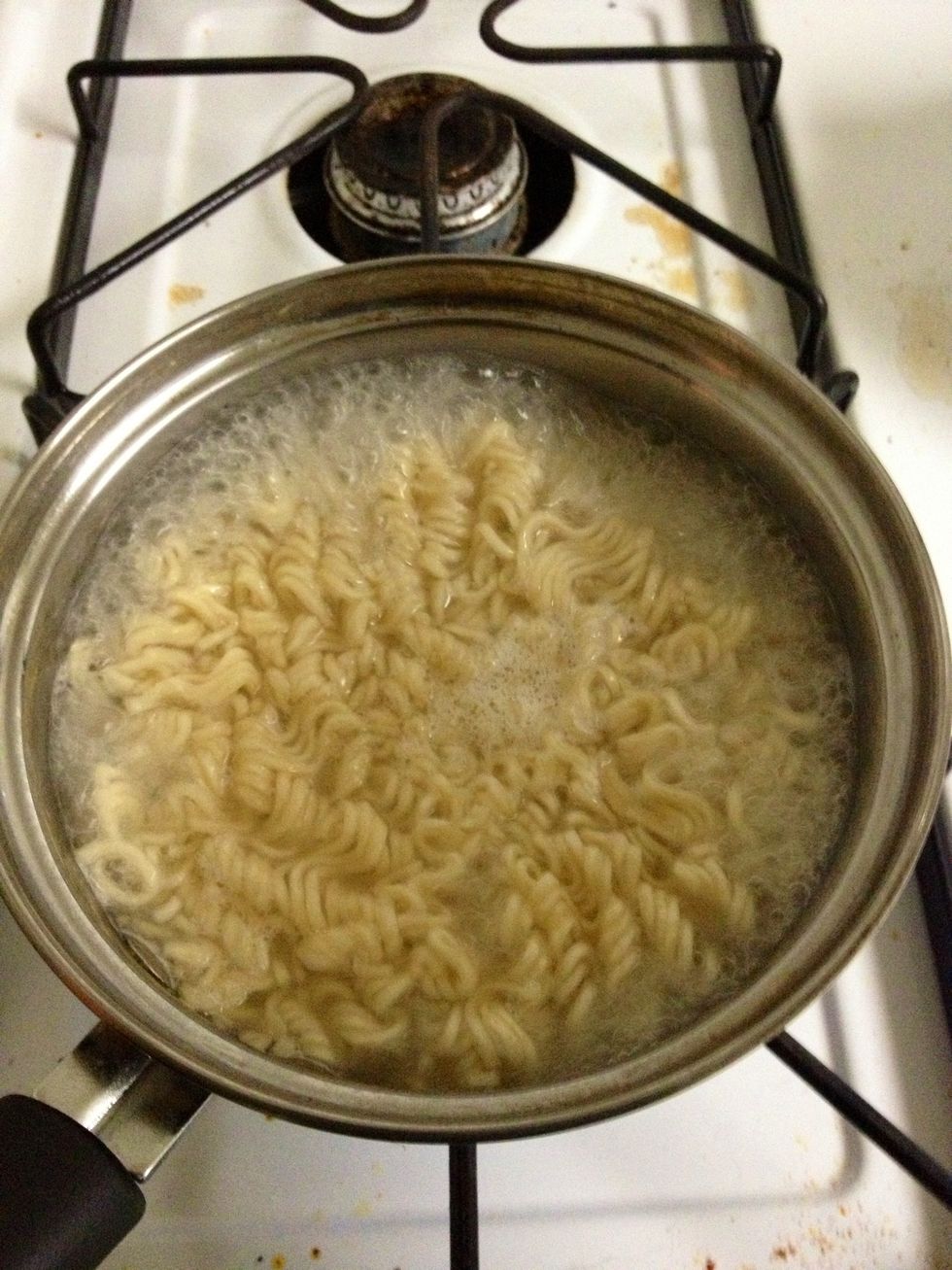Boil until a little before desired consistency of noodles