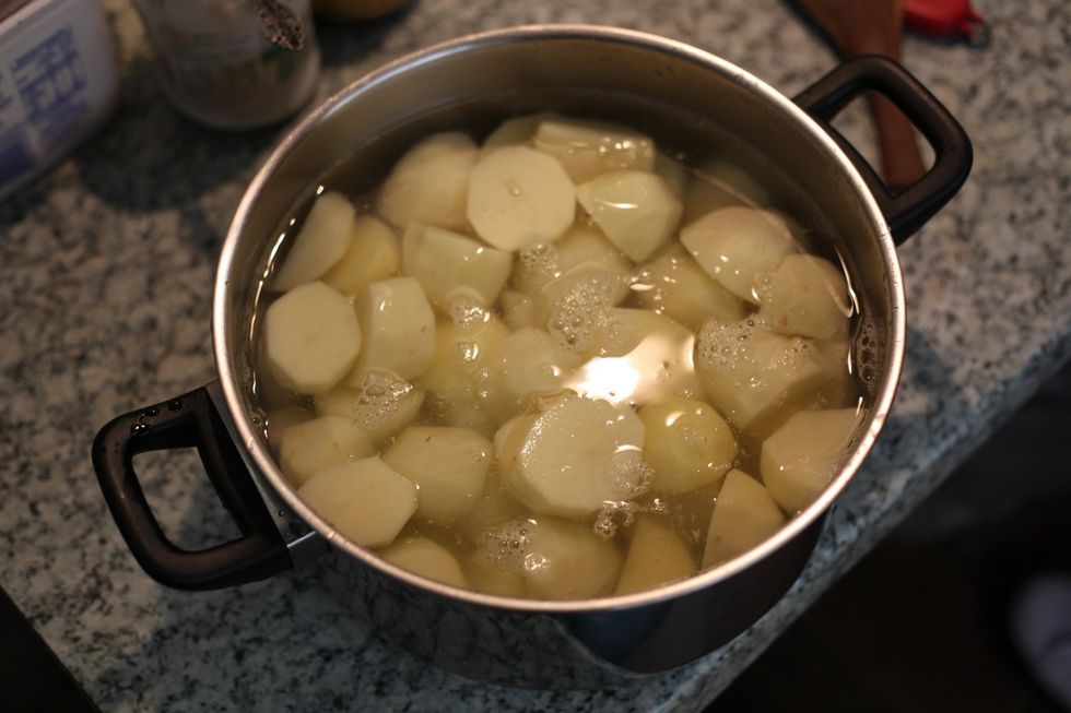 Boil until very soft. Please note its best to have all the ingredients close together. We want to work with Hot Potatoes when we mash. So when it's ready don't strain it. Let's do the filling.