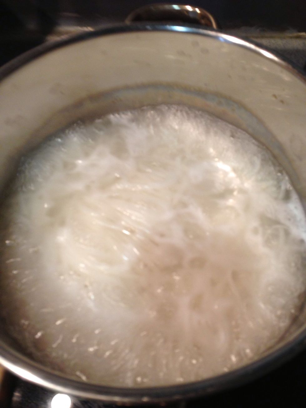 Boil water and add the dry rice noodle- it usually take around 1 min. Drain and rinse it with cold water.