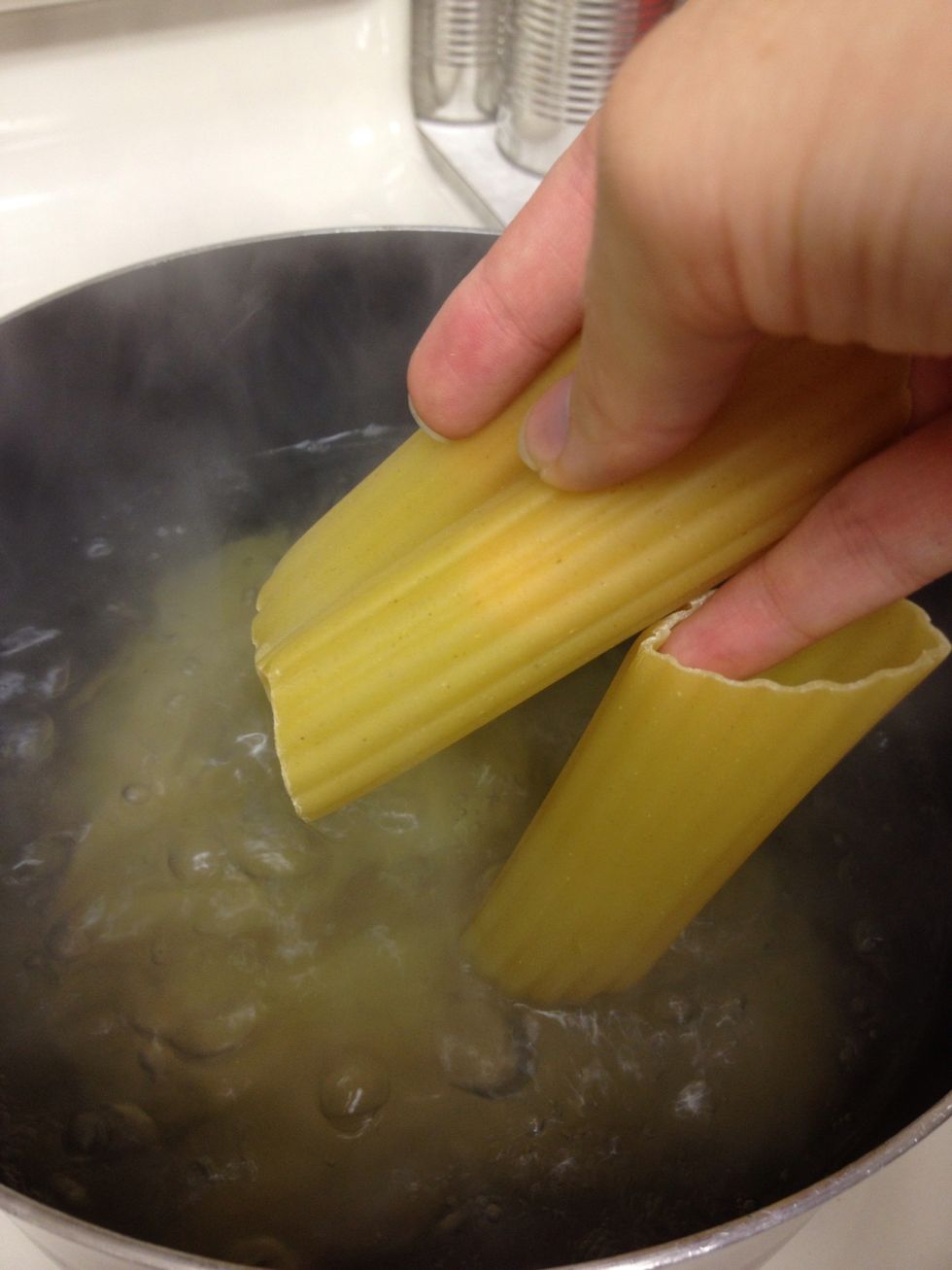 Boil water and cook manicotti according to package instructions. Adding a tsp of oil and a pinch if salt helps to keep the noodles from sticking.