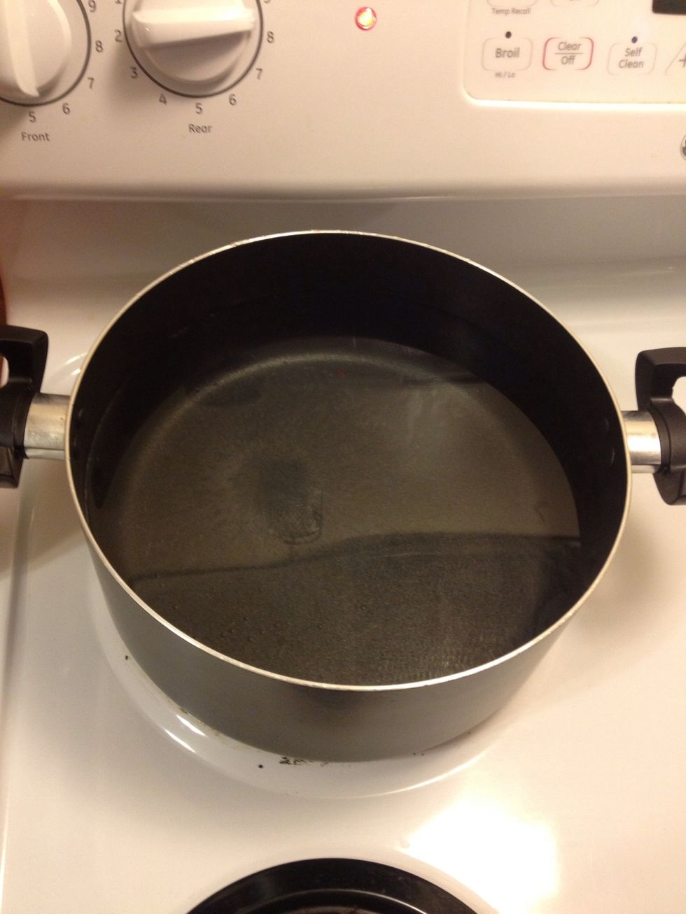 Boil water and cook pasta according to box, preheat broiler on low