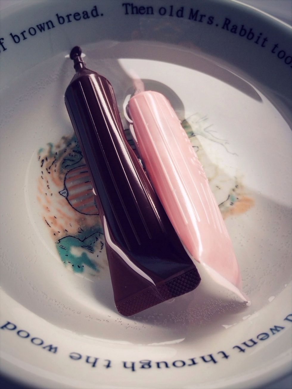 Boil Water and let sit for 2 minutes, then submerge chocolate and strawberry tubes (unopened) in the water until melted thoroughly- Check to see if smooshy after few minutes but before water cools