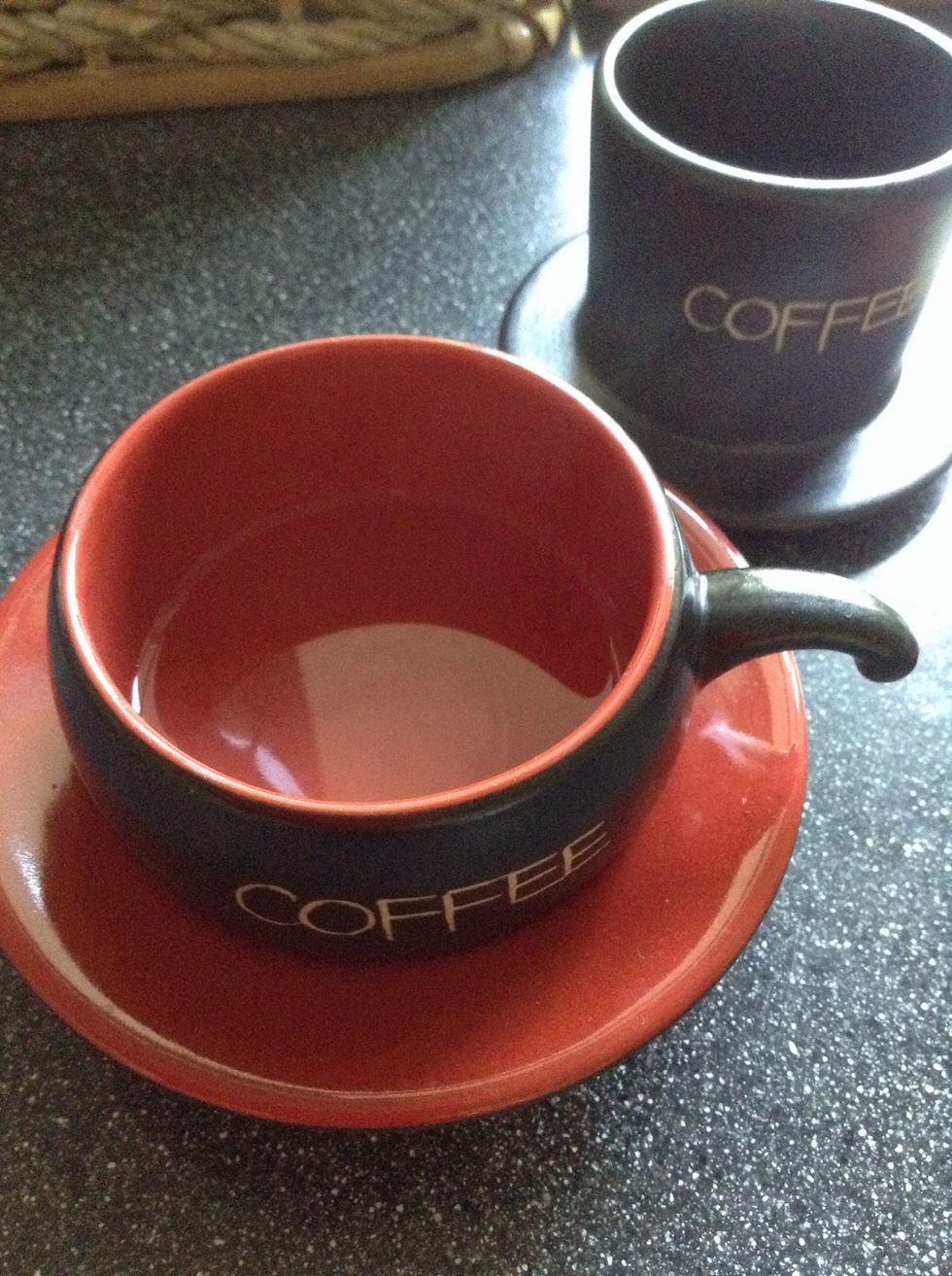 Boil water and pour a little bit into the cup to warm up the clay or whatever cup/mug you're using. Leave it for about 30-40 seconds while swirling it, then remove water from cup.