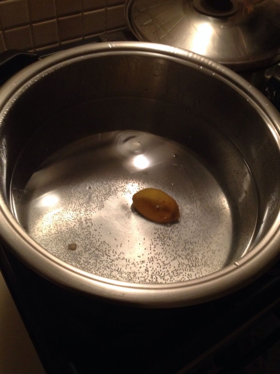 Boil water in a large pan. I filled it till the half. Squeeze half lemon and throw the lemon in the water.