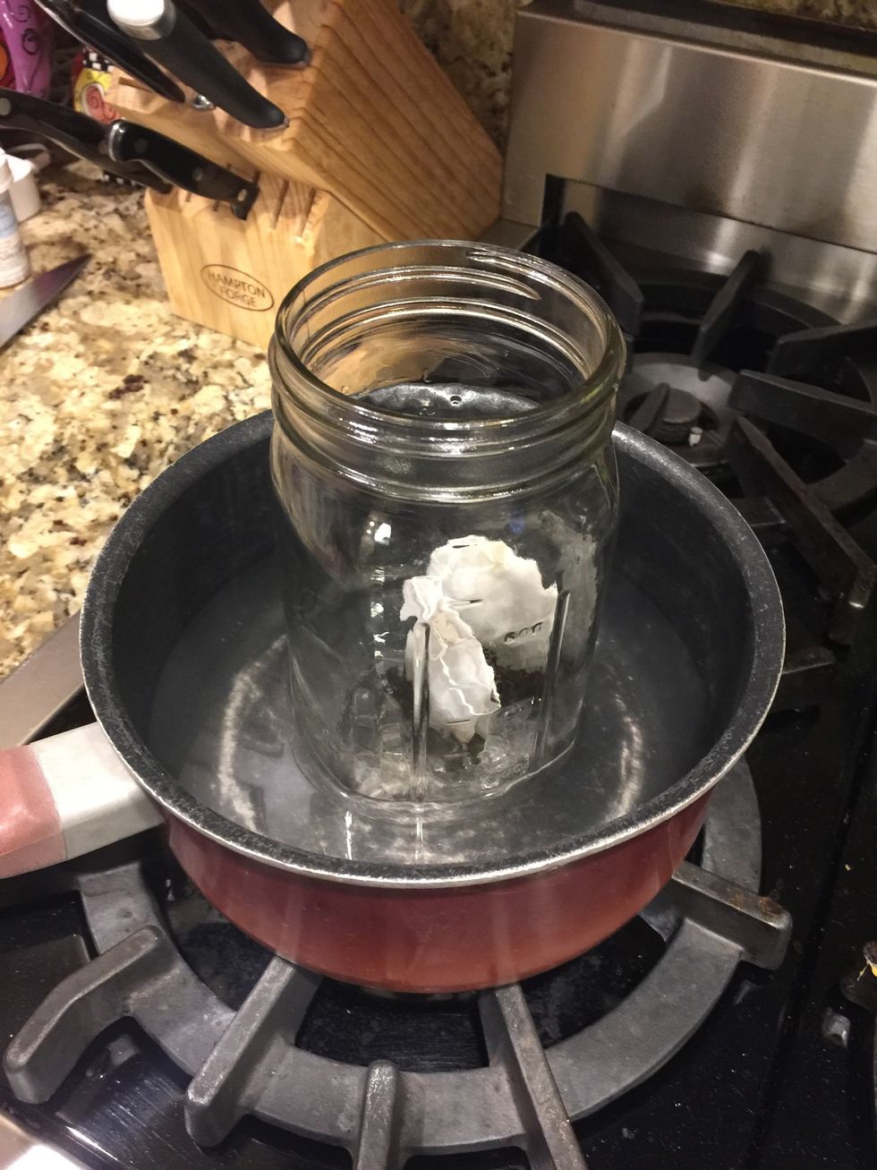 Boil water, place mason jar in water, then add 1 TBSP of coconut oil and 2 tea bags of green tea (any flavor). Allow to melt then steep for 1 hour
