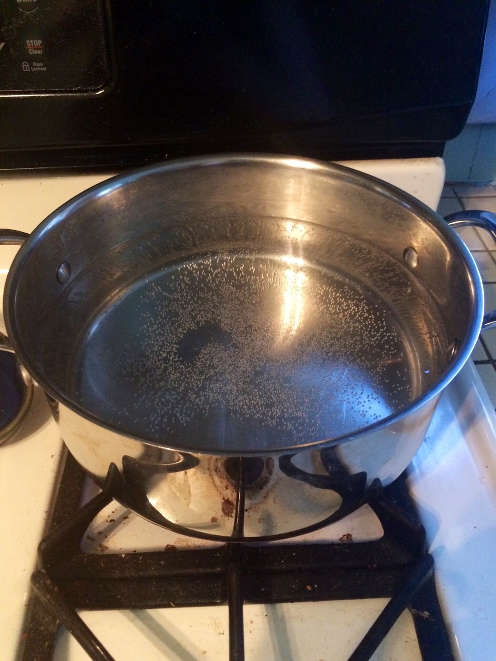 Boil water plus 1 Tablespoon of salt in a large pan.