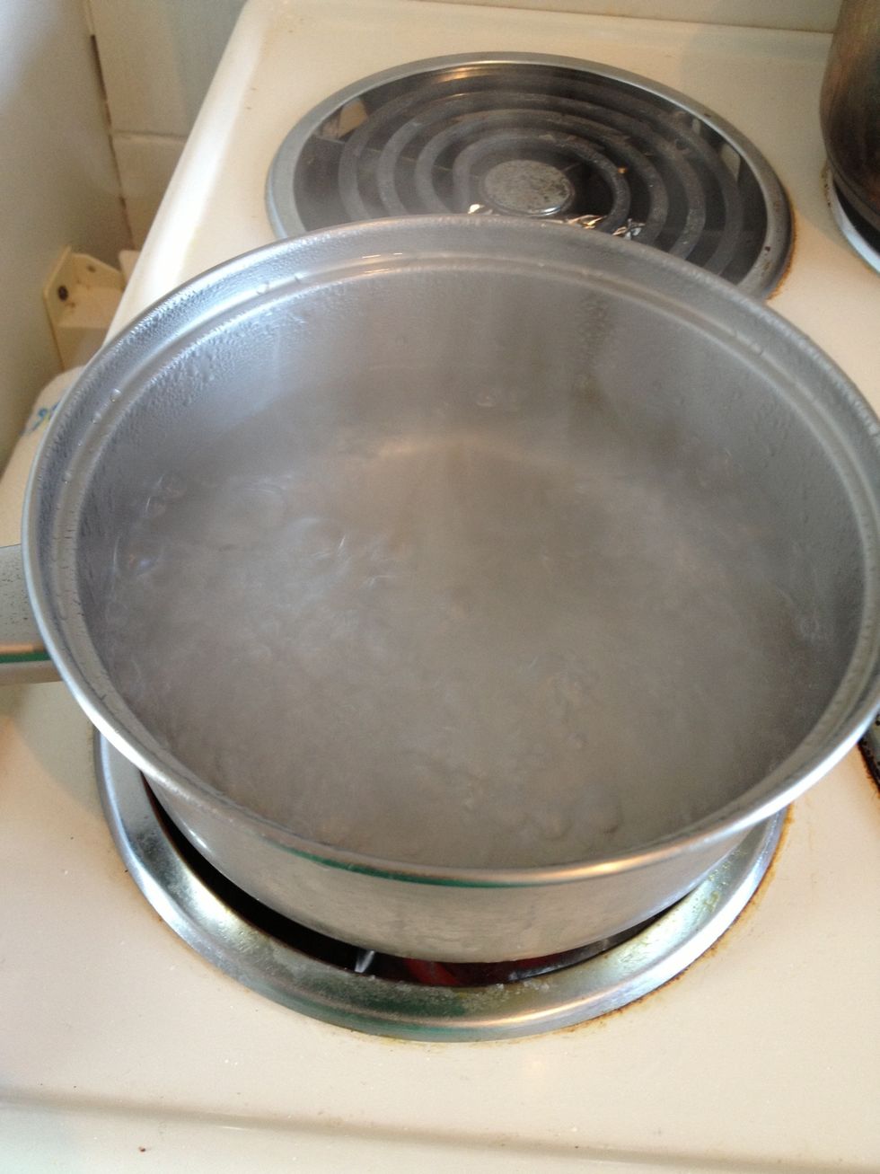 Boil water with a little bit of salt to cook spaghetti