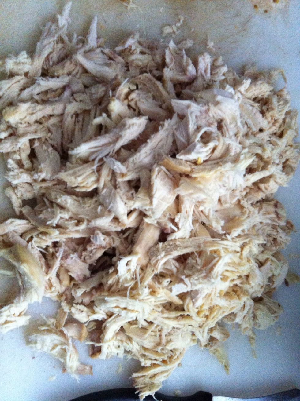 Boil your chicken in water until cooked,then shred it to pieces.