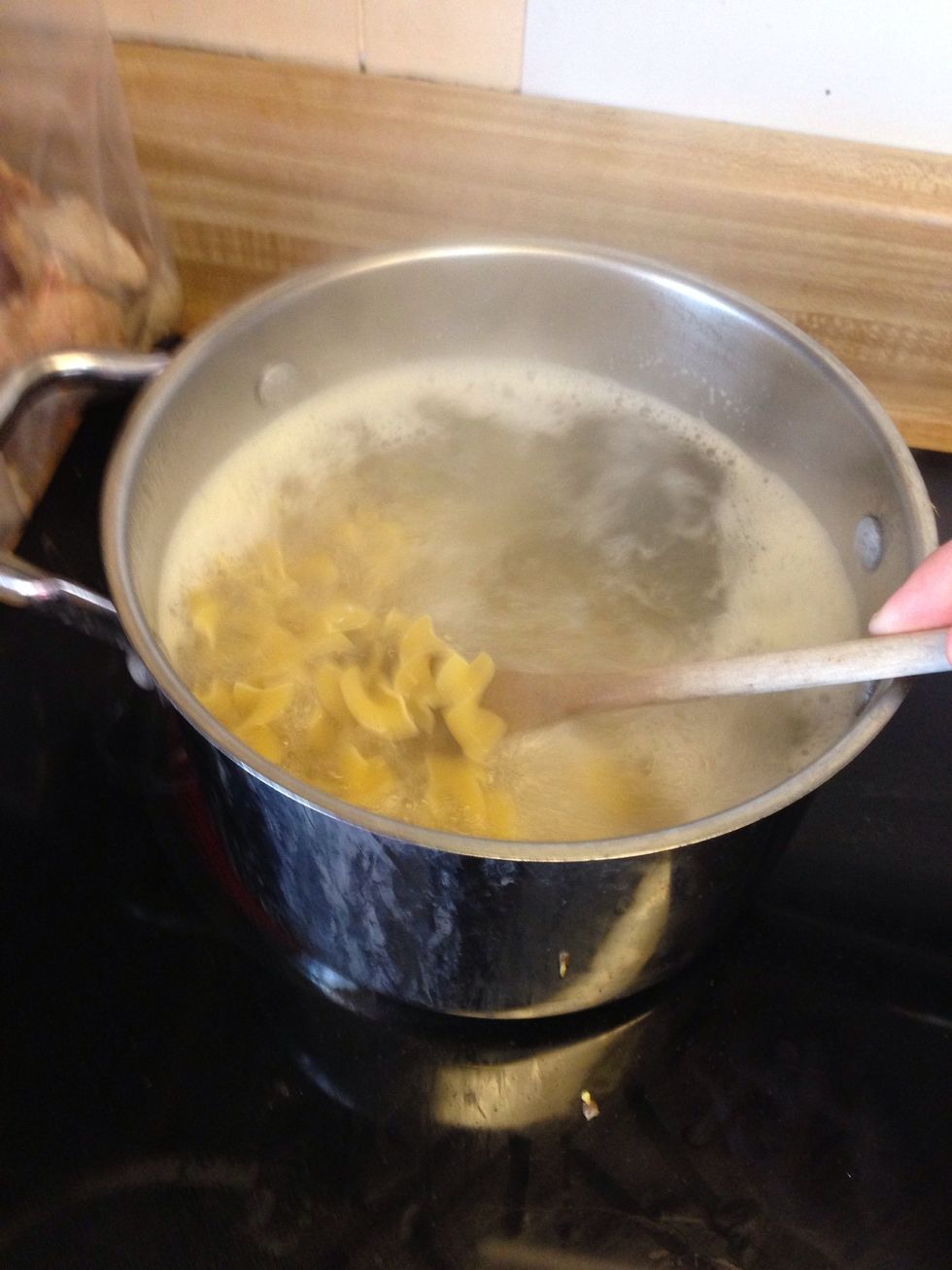 Boil your egg noodles in salted water. Stop cooking one minute before they are completely finished. They will finish cooking in the sauce and not get too mushy. In the meantime you can make the sauce.
