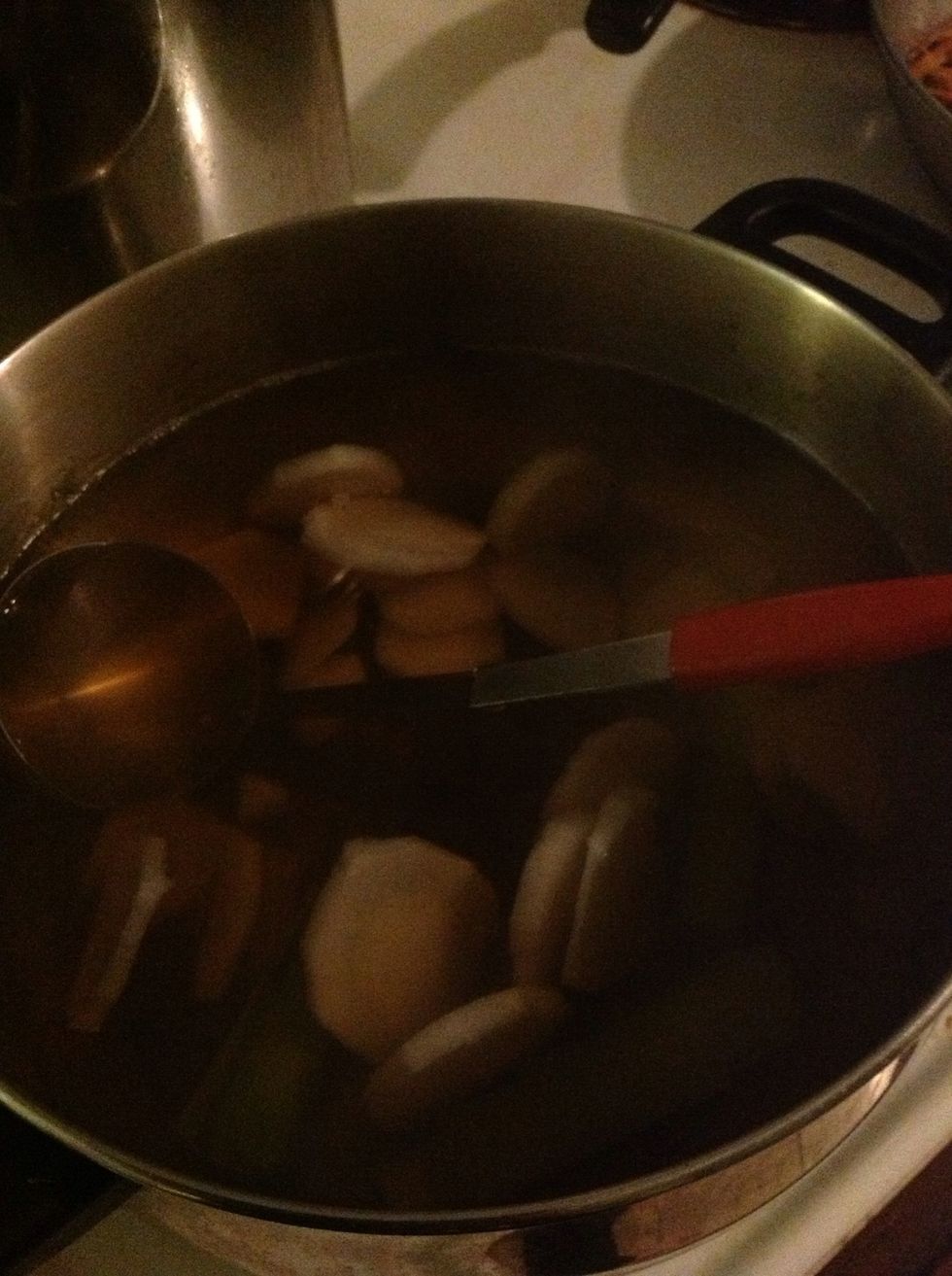 Boiled the kombu, mini fishes and mushrooms for a half hour to make the stock rich and delicious. I added the daikon near then end to cook in the broth.