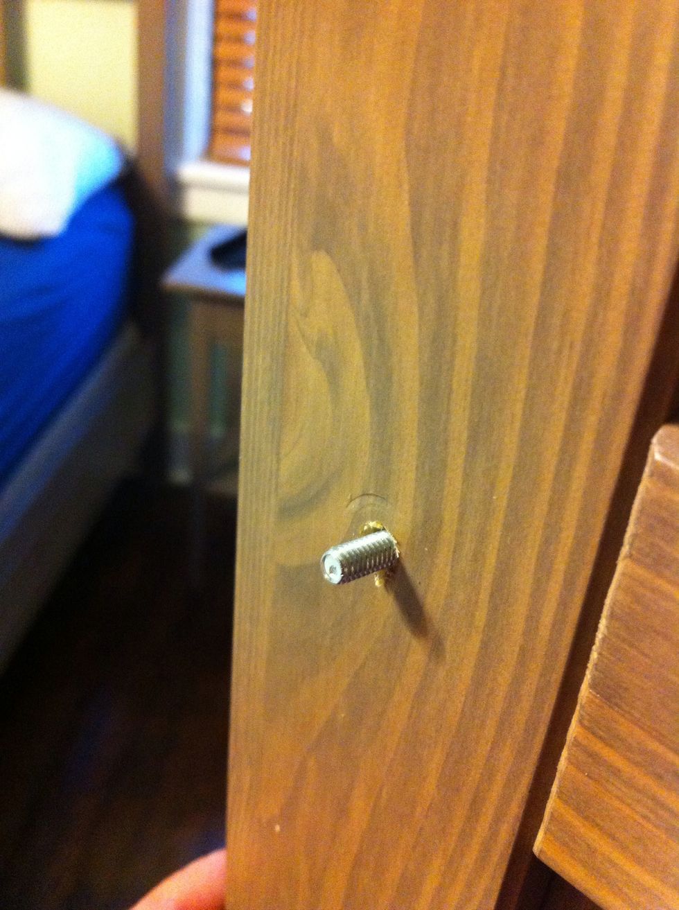 Boom. Screw sticks out just far enough to get the knob on.