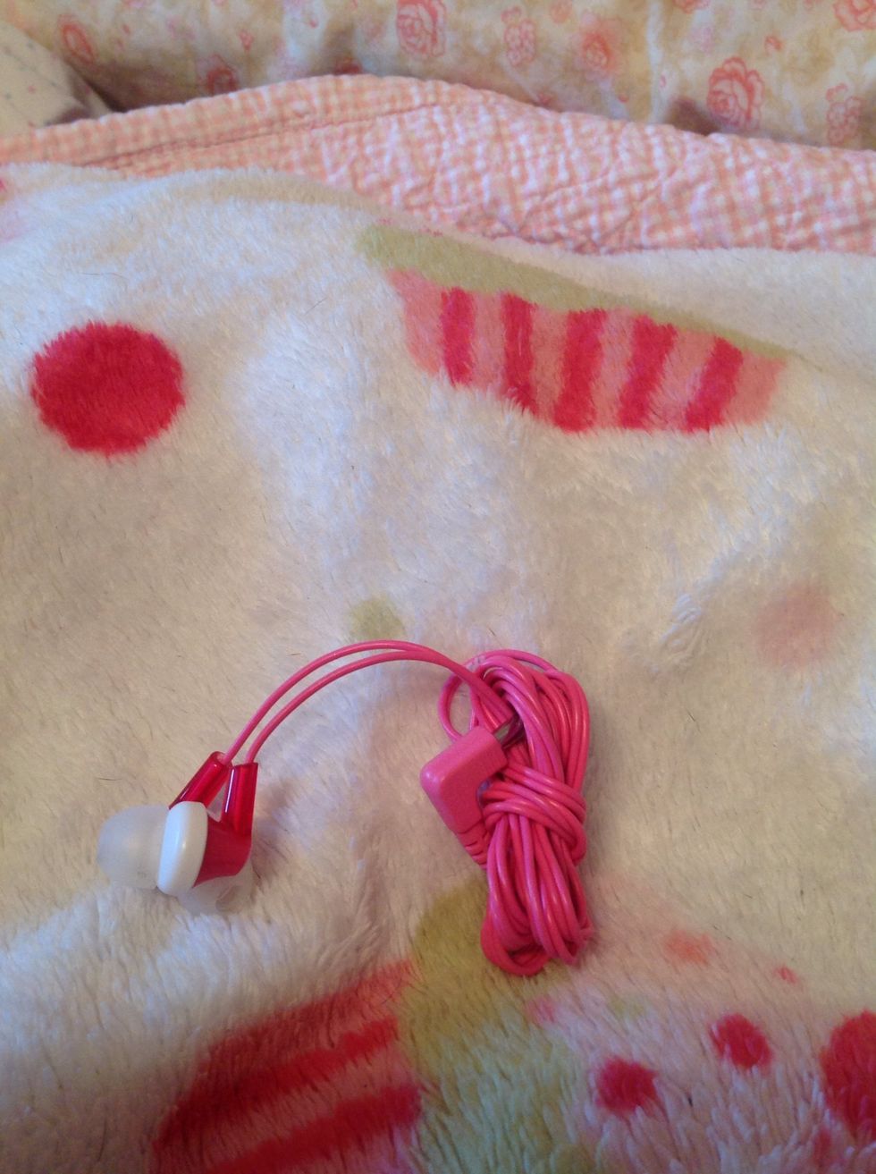 Boom! You've done it! Know you can wrap your earbuds tangle free!