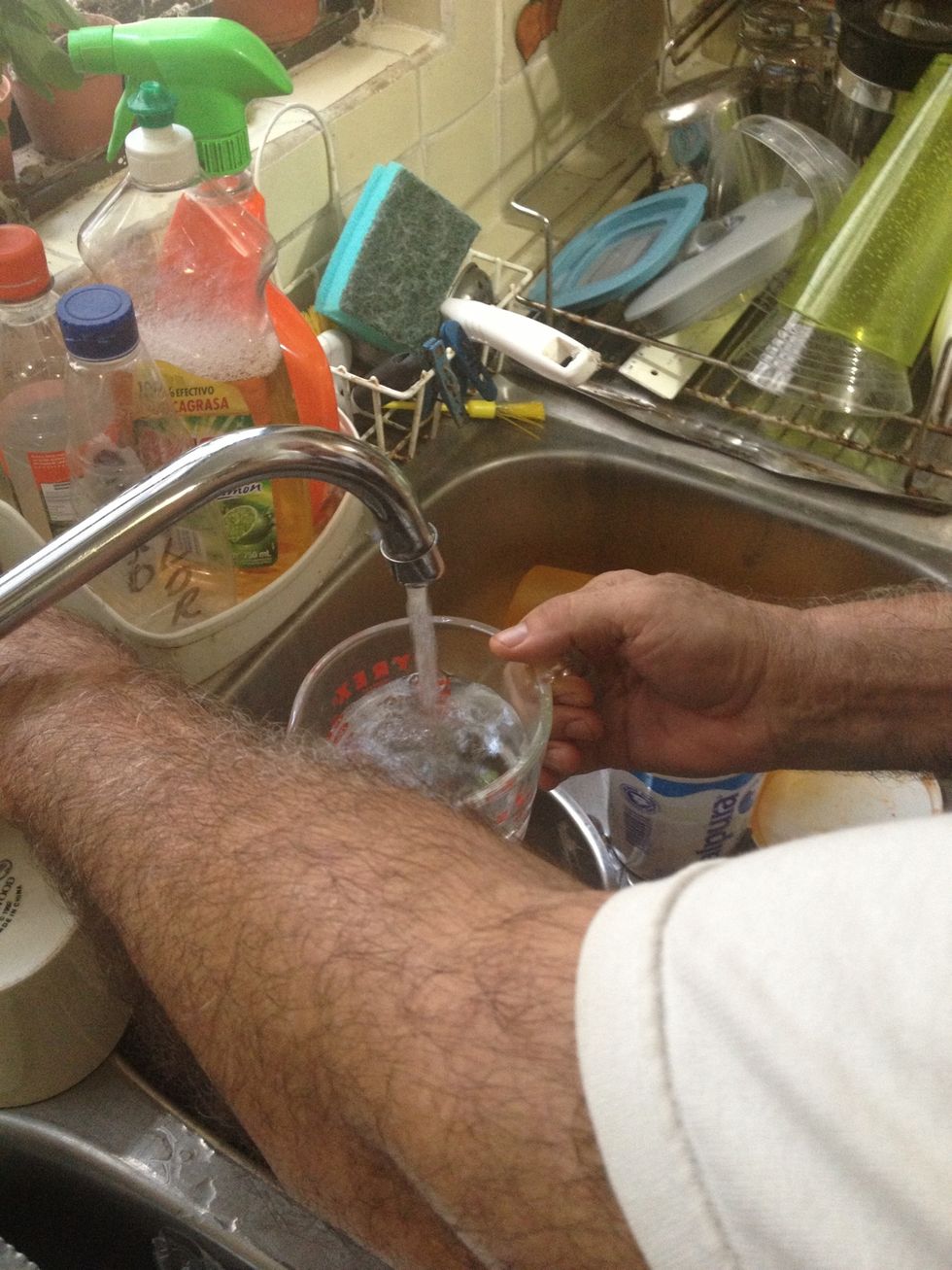 Both cups! NOTE: the pur\u00e9ed tomatoes count in the total volume of water, so it's roughly 1 cup and a half.