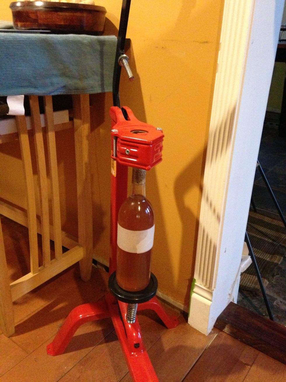 Bottle and consume within 1 month at room temp. In refrigerator it will keep for 4 months. Contact with natural corks at room temp will result in popped corks every time .