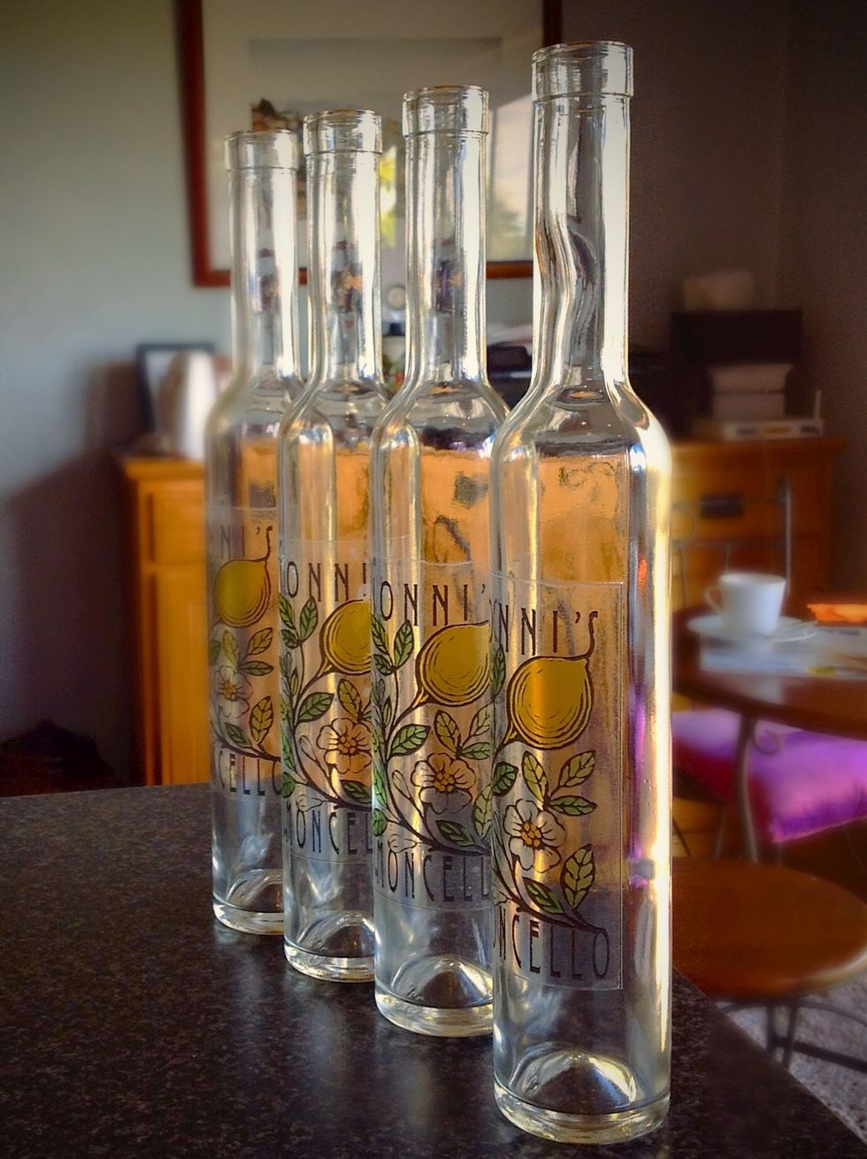 Bottles can be purchased from suppliers such as: http://www.galaimports.biz/ Clear sticky labels can be printed at home: http://www.labelsbythesheet.com