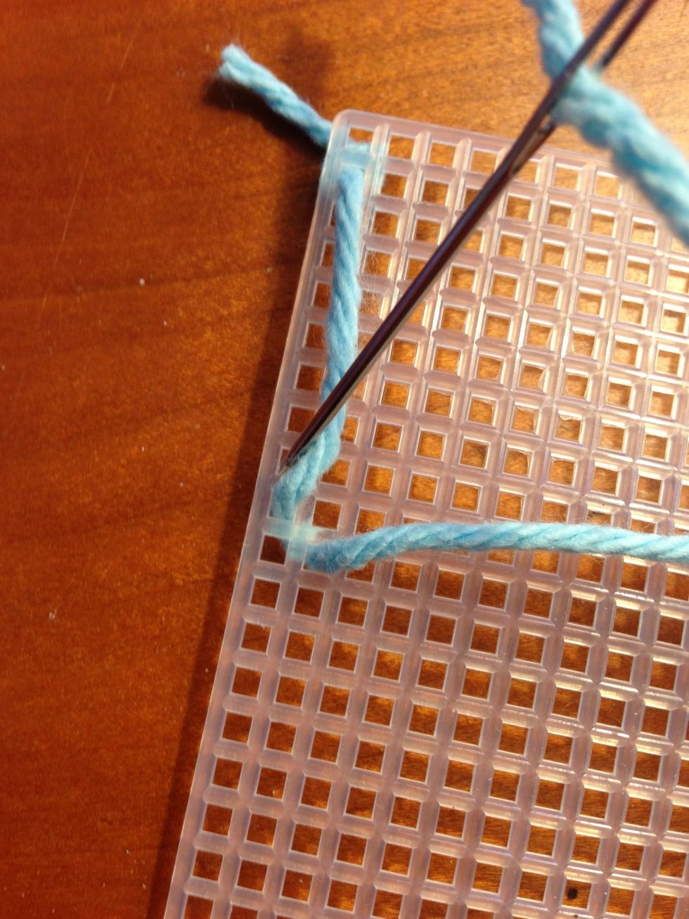 Bottom view. Alternate stitches on each side of the straight length to trap it in the middle.