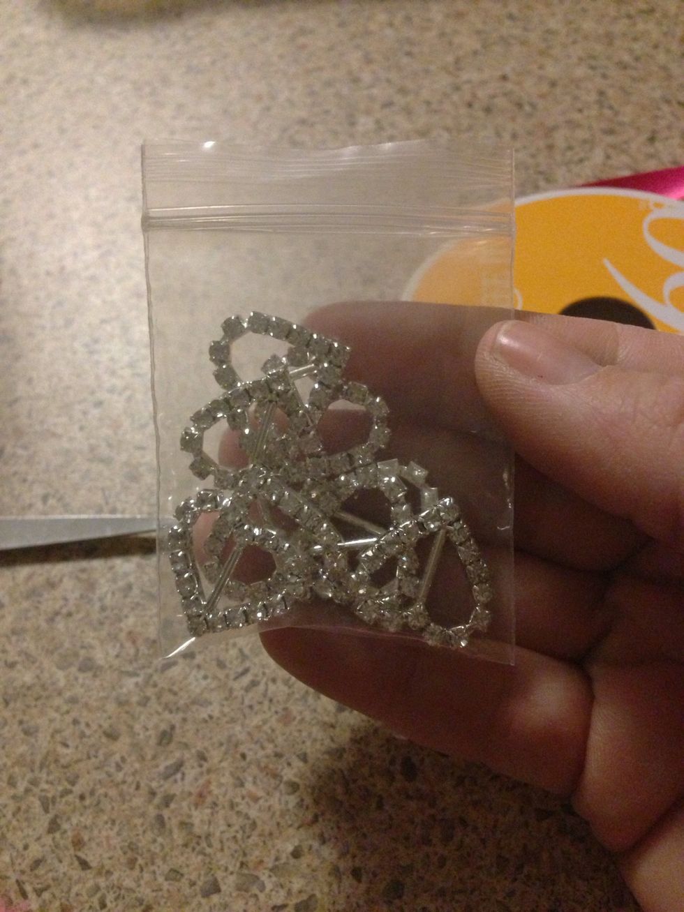 Bought these heart gems off eBay as well. It's worth buying them there rather than the craft store because you will increase your costs exponentially! Notice the bar in the middle. This is for ribbon