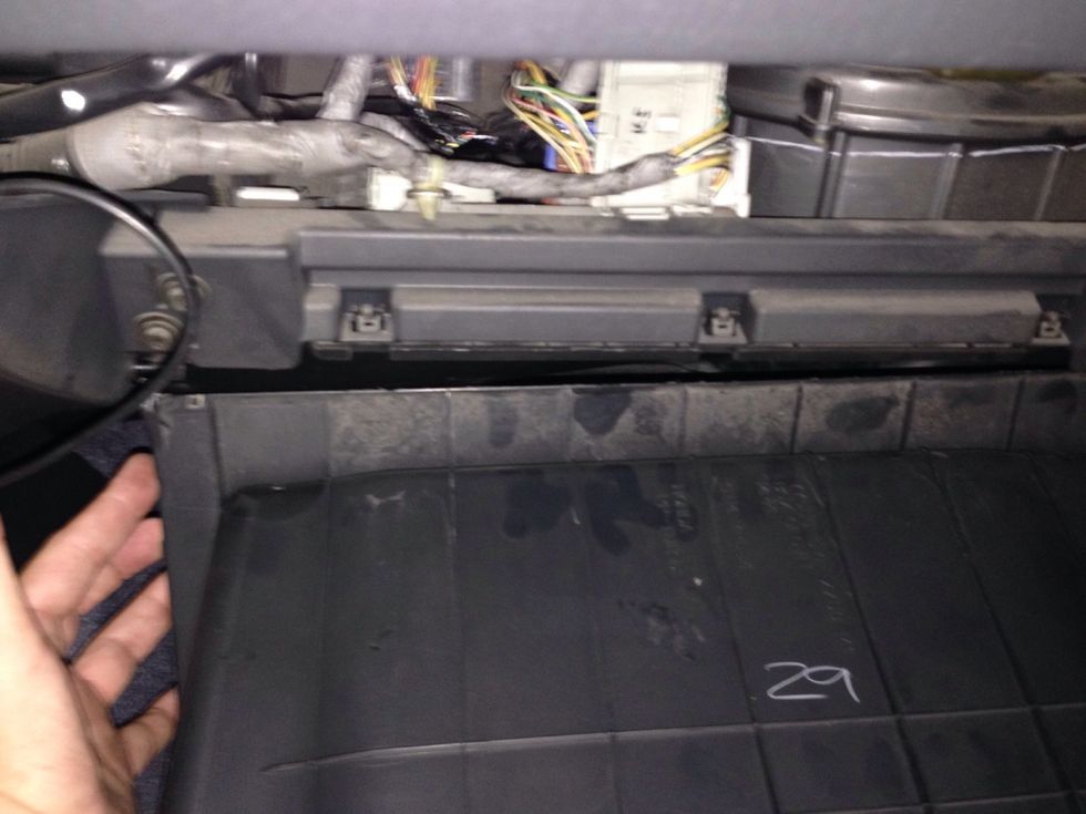 Box will drop, and you may have to remove it in some cars. Not on mine. Be careful not to lean on it and break the hinges.