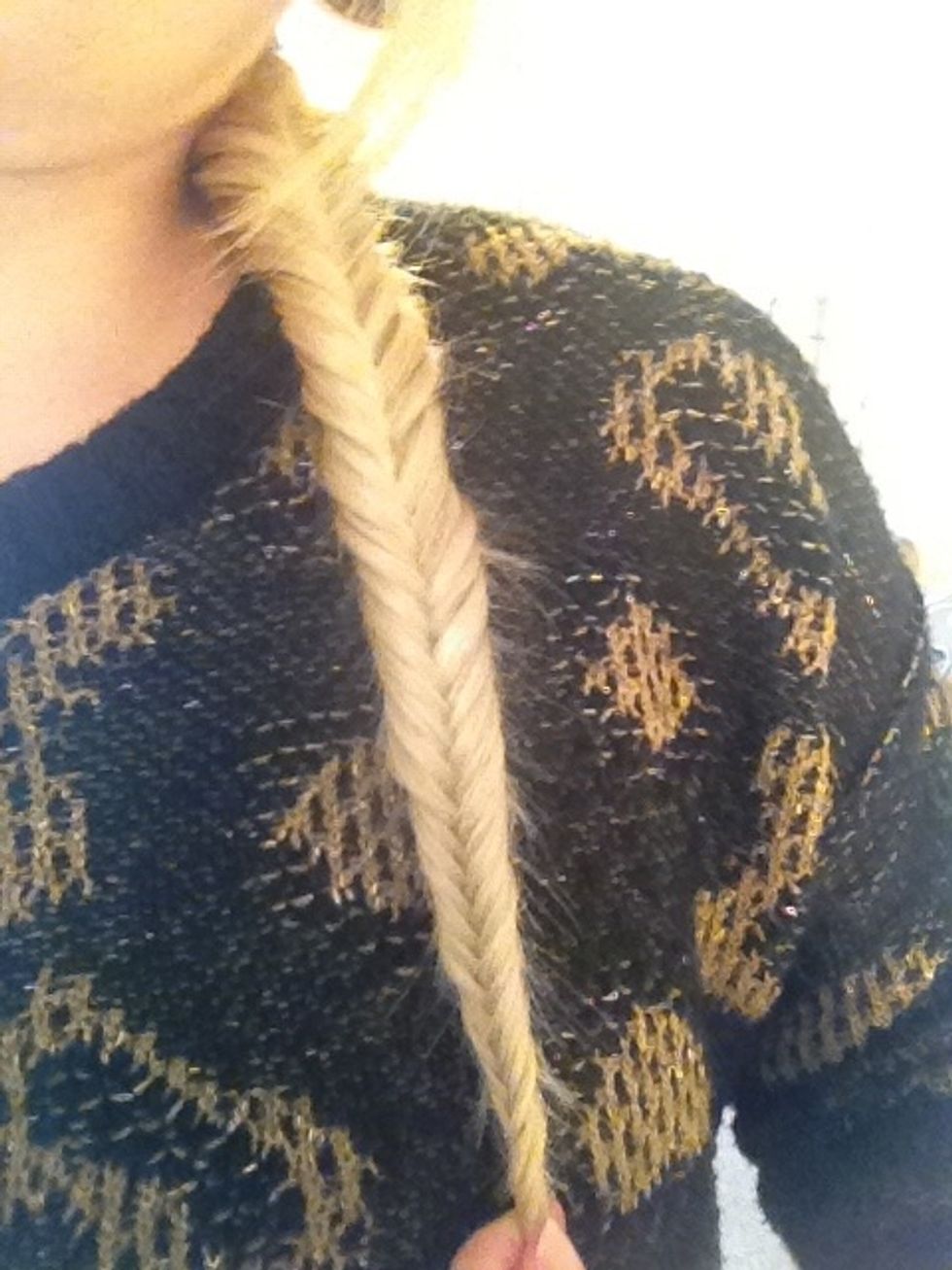 Braid all the way to the end and fix with a hair band