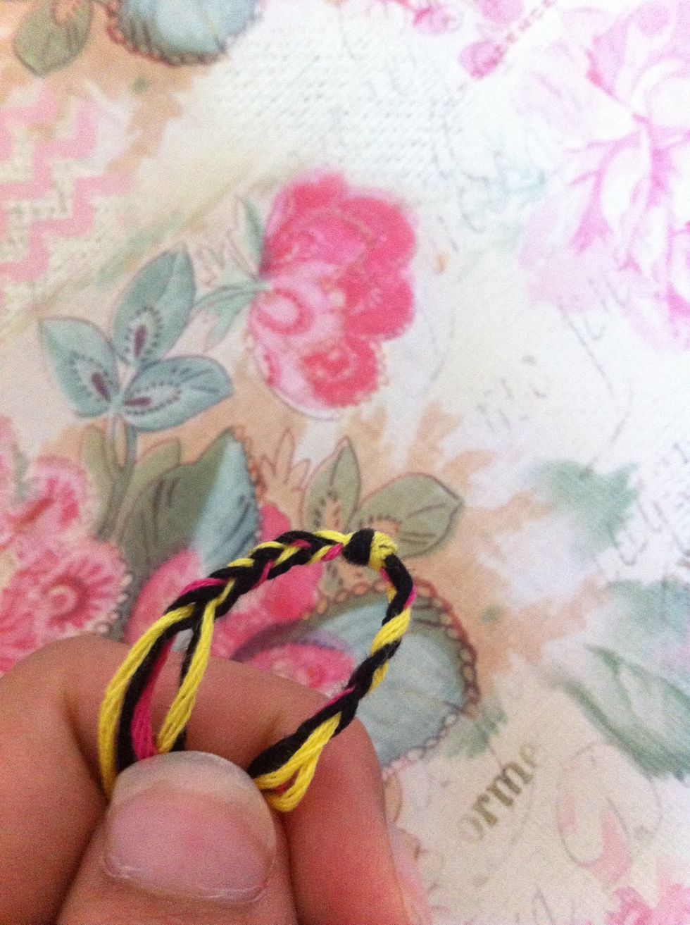 Braid down both side of the knot.