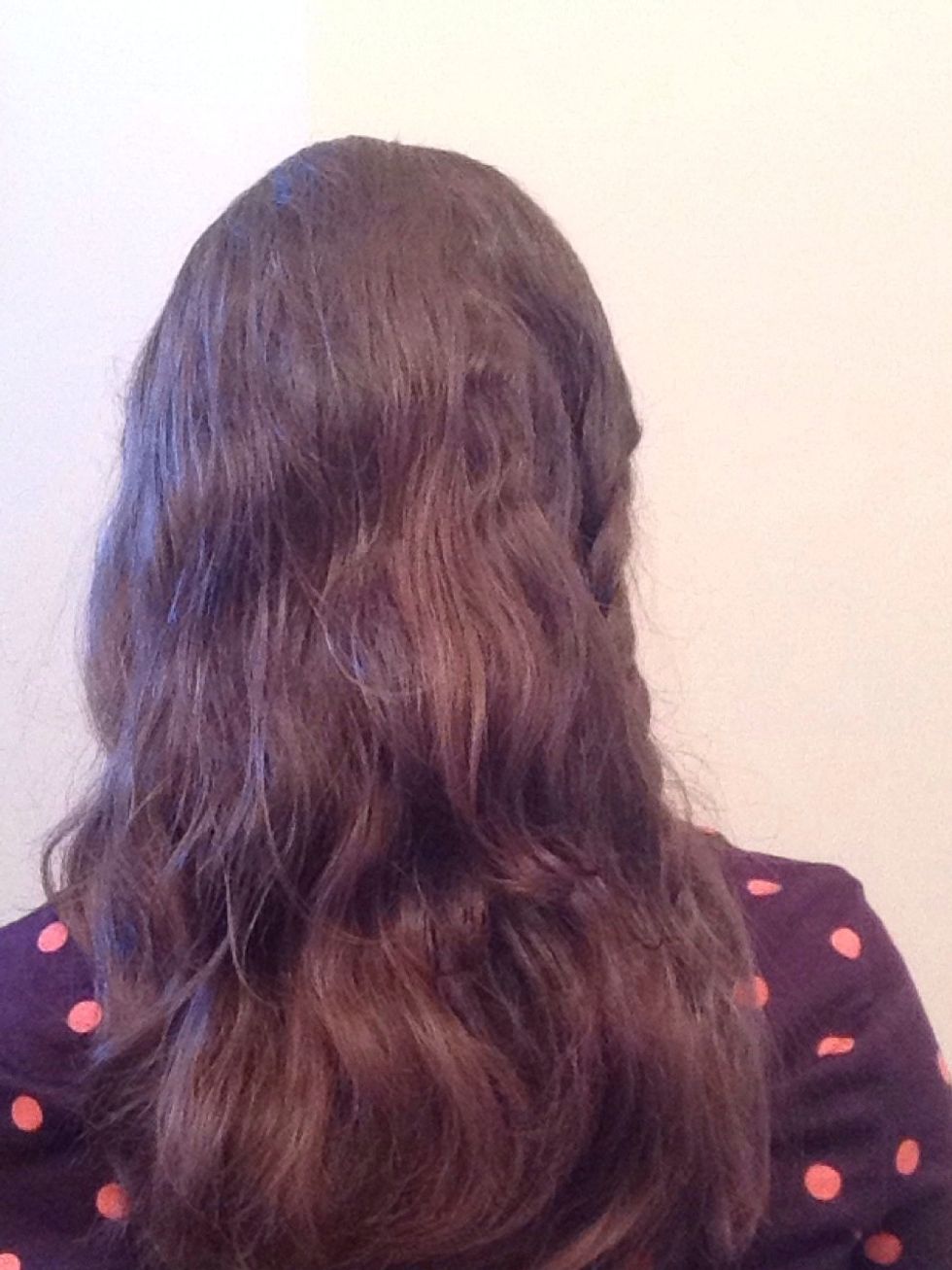 Braid that section, and pull your hair to the back of your head.