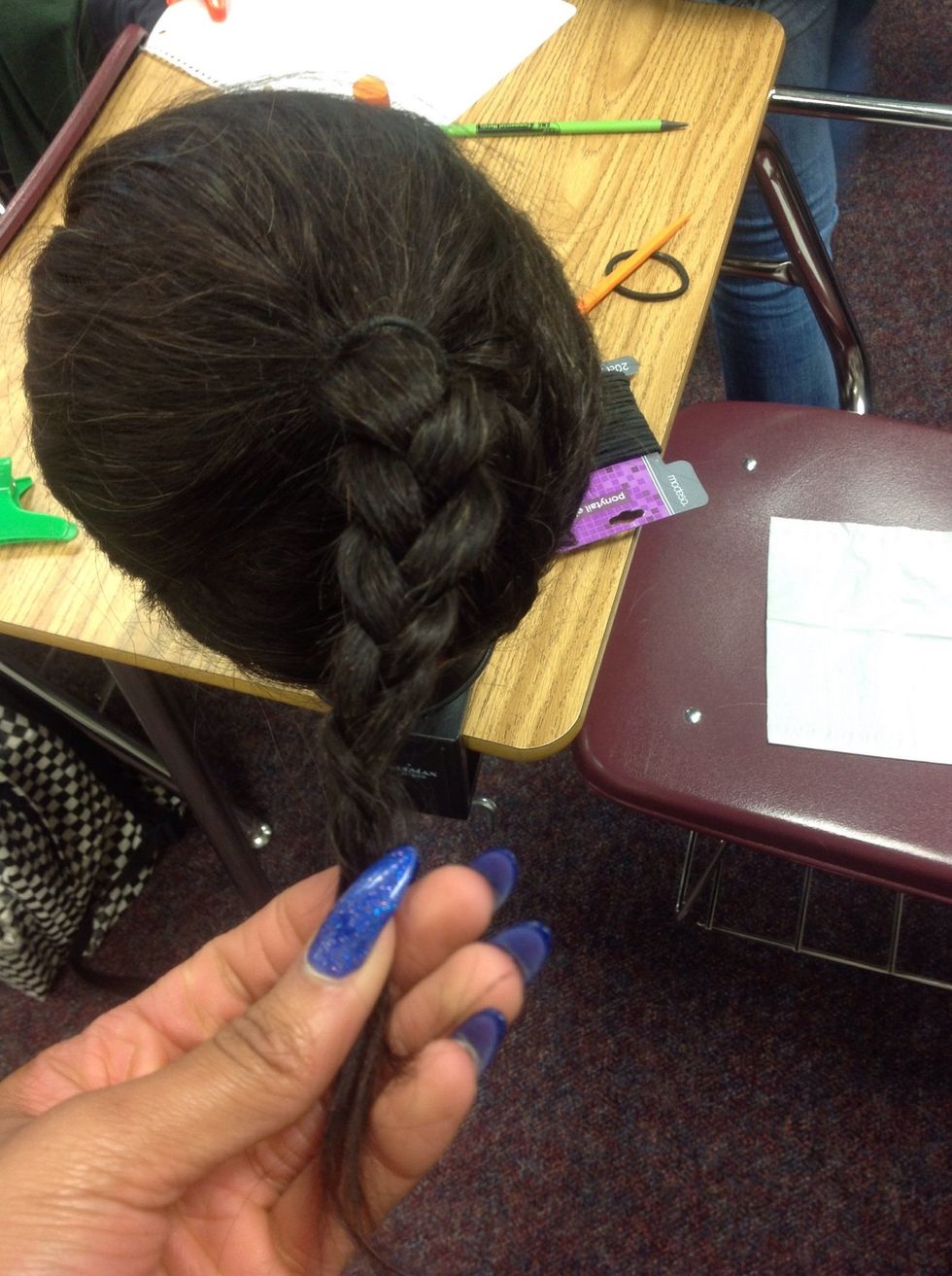 Braid the hair left in the ponytail