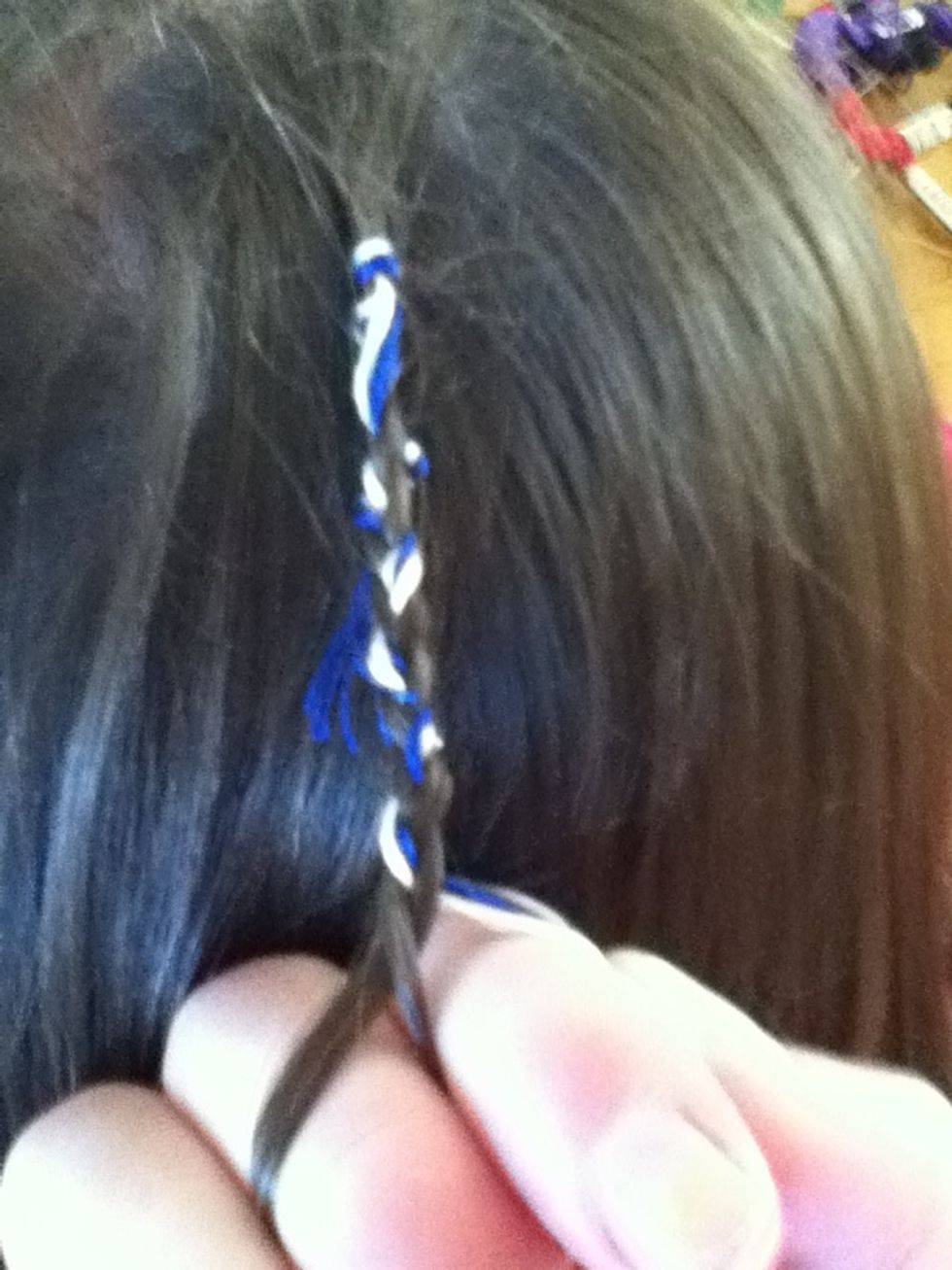 Braid the top part of hair, about 5cm down