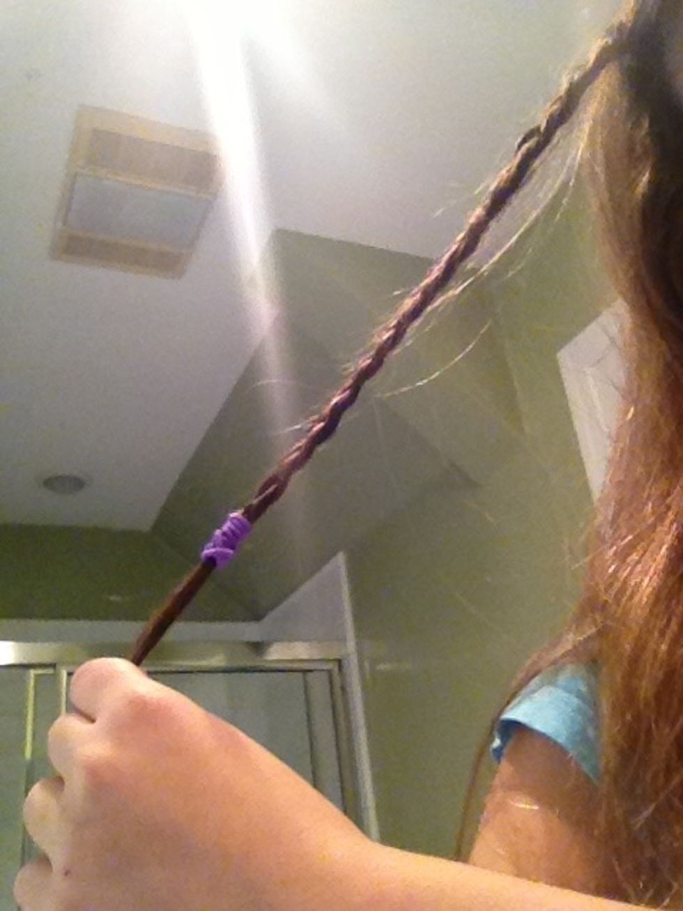 Braid. Tip: when you braid pull your hair to the side instead of down (like shown in the pic)