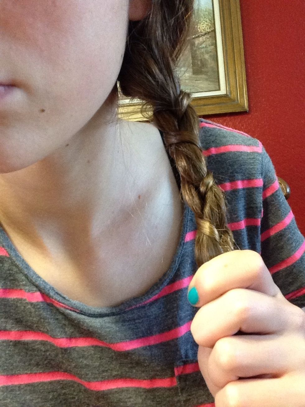 Braid until you've reached the end of your hair length.