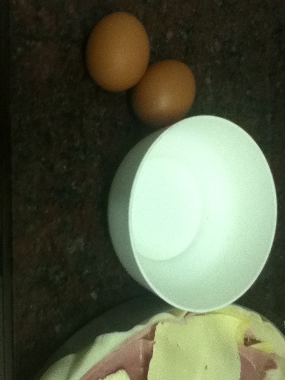 Break 2 eggs and start mixing them