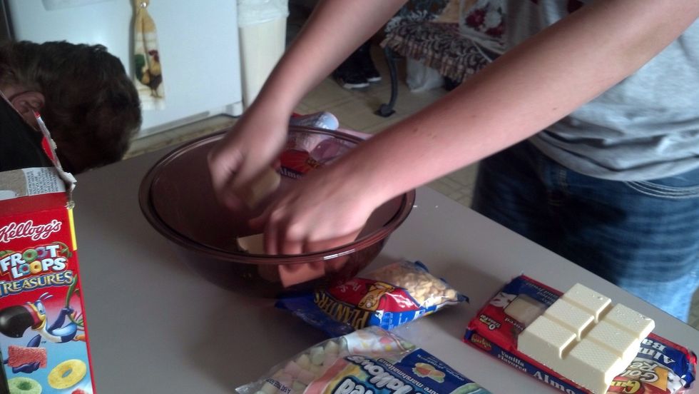 break 2lbs of almond bark into a bowl