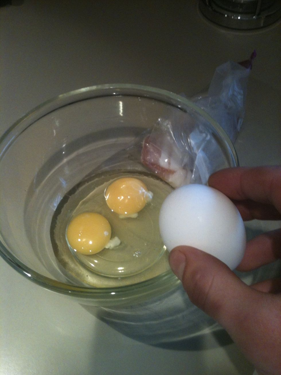 Break 3 eggs into mixing bowl, make sure to choose a bowl big enough for the bread to fit in