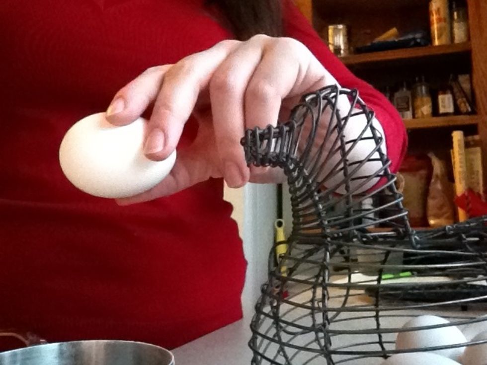 Break 4 eggs in small bowl.