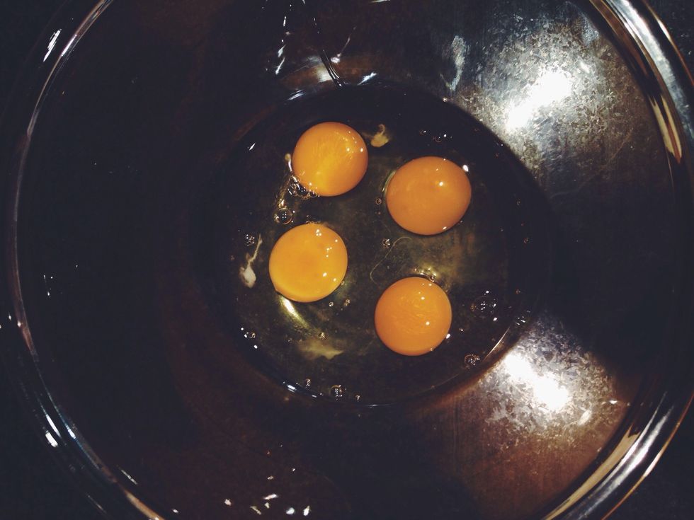 Break 4 eggs into a bowl