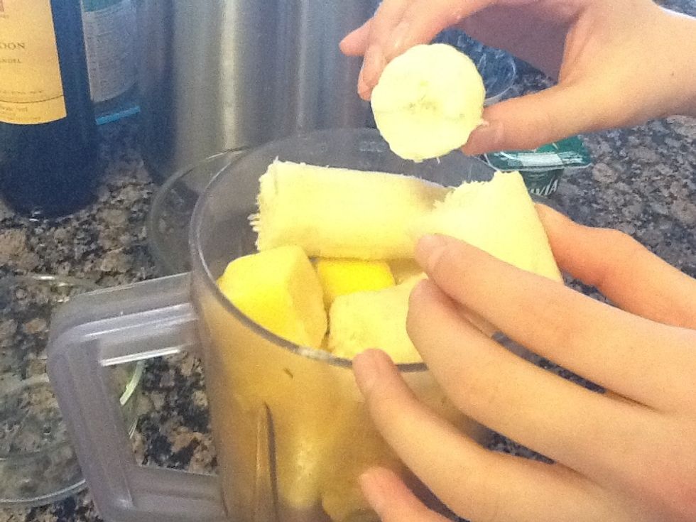 Break apart bananas. And put them into the blender.